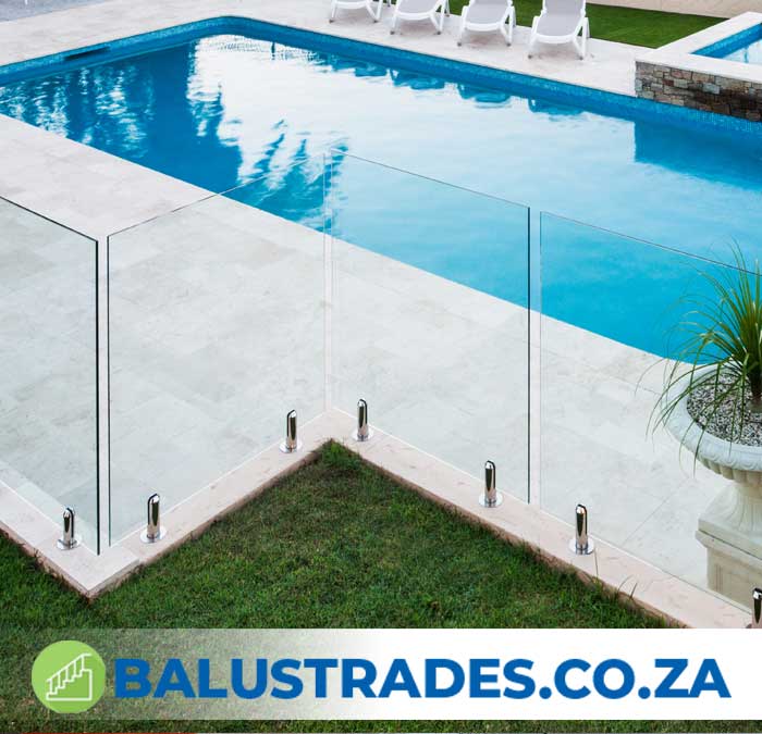 frameless-glass-balustrade-with-handrail3 frameless balustrades
